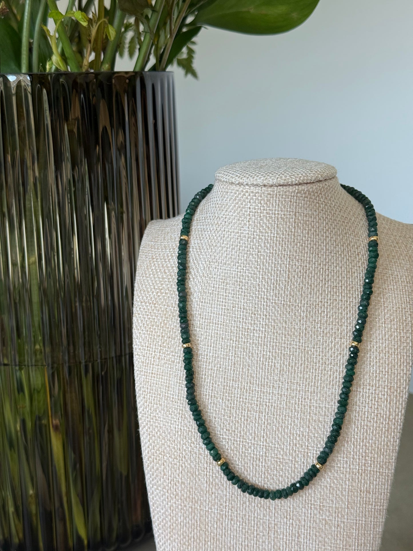 Pictured emerald necklace with gold spacers