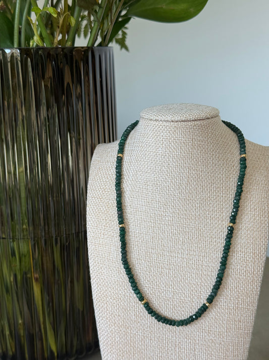 Pictured emerald necklace with gold spacers